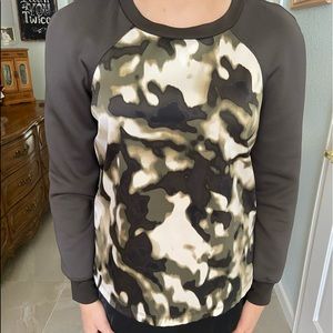 Green and white blouse